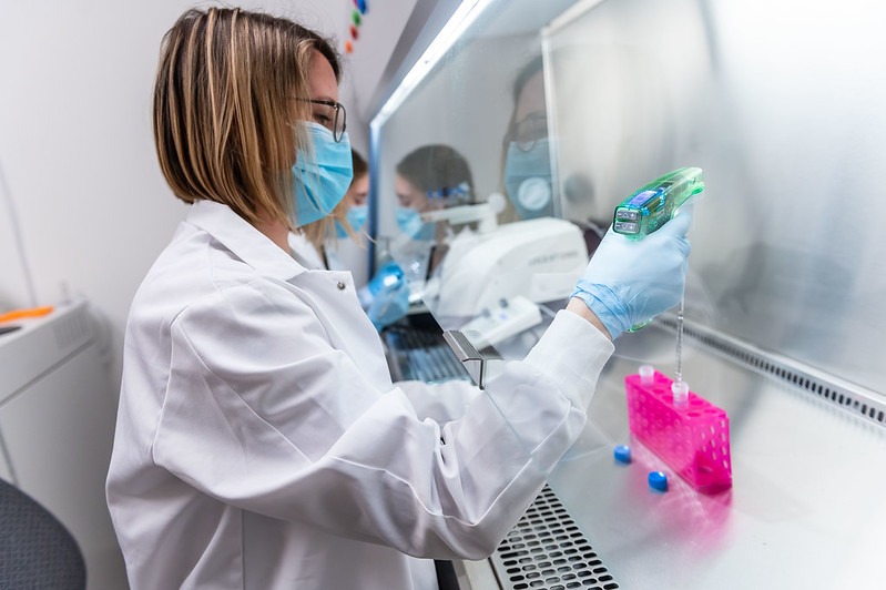 Researcher working with samples in the lab.